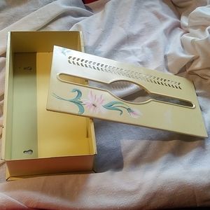 Vintage metal tissue holder for wall or counter.